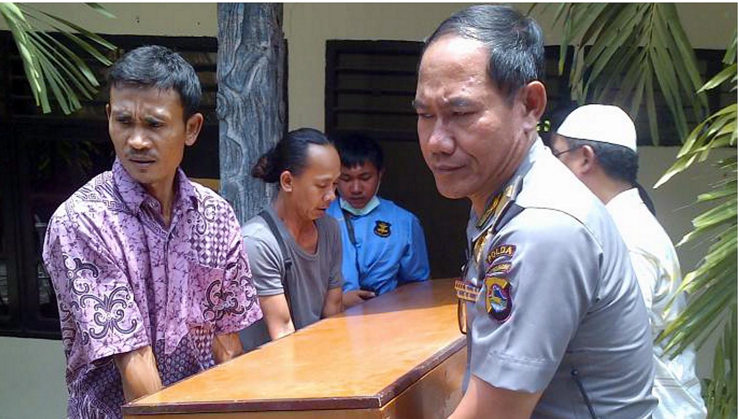 Indonesian officials carrying the body of the late Mr Ahmad Suri who was allegedly stabbed by a suspect identified as Patro in Lombok, Indonesia. The late Mr Ahmad who worked as an engineer in Lombok, was stabbed seven times, including in the face, n