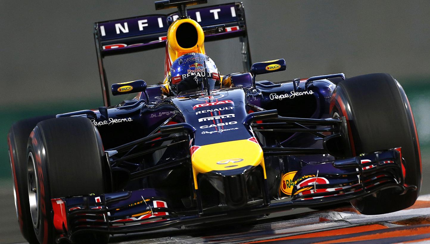 Red Bull Formula One driver Sebastian Vettel of Germany drives during the qualifying session of the Abu Dhabi grand prix on Nov 22, 2014. -- PHOTO: REUTERS