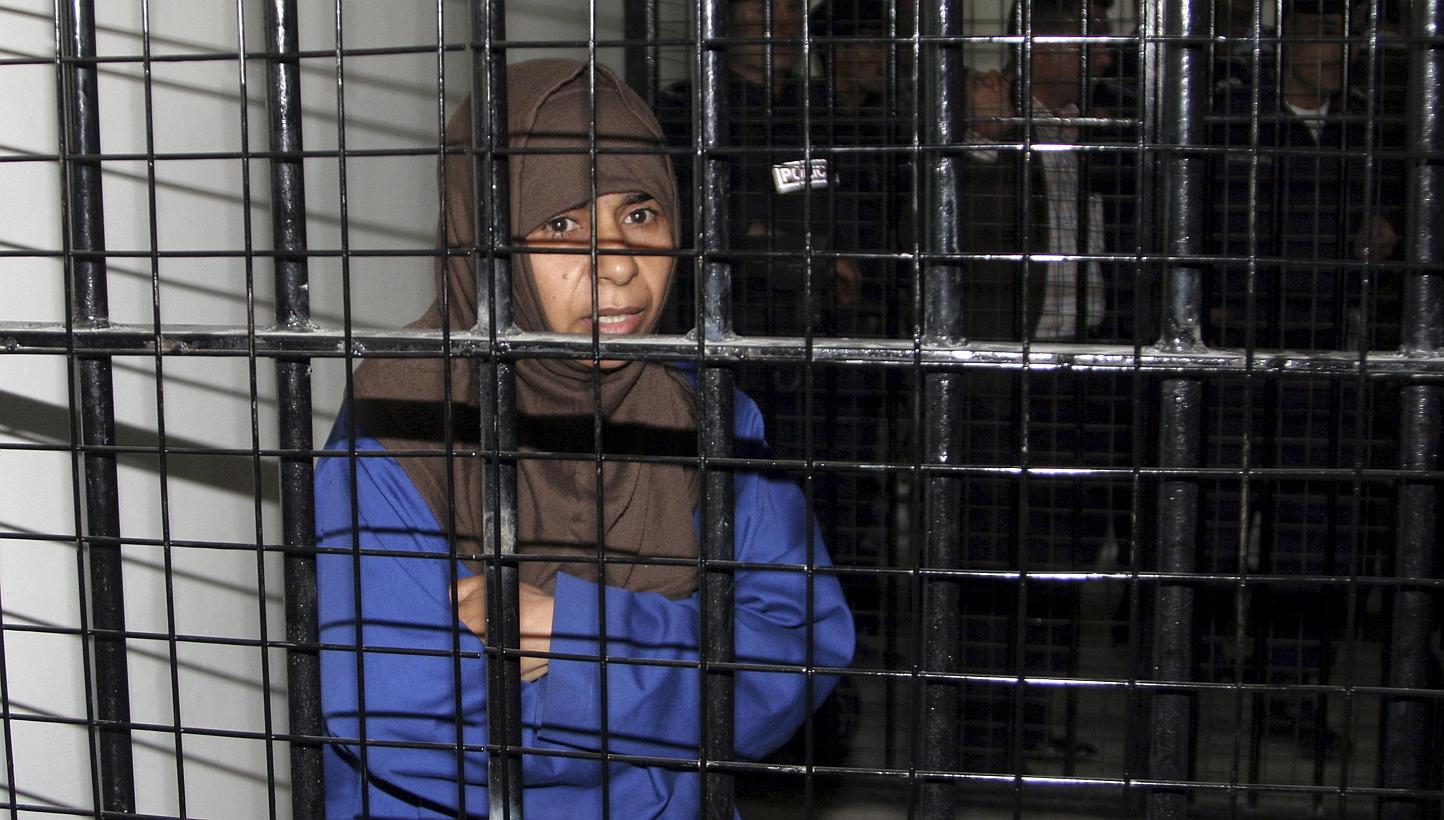 Iraqi Sajida al-Rishawi stands inside a military court at Juwaida prison in Amman in this April 24, 2006 file photo.&nbsp;The Islamic State in Iraq and Syria (ISIS) group's demand that a militant on Jordan's death row be exchanged for a Japanese host