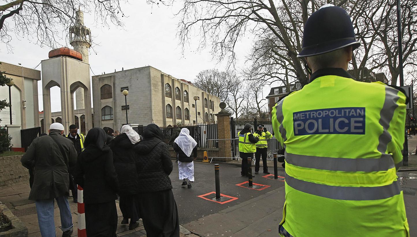 Police carry out a regular patrol as worshippers arrive at the London Central Mosque at Regent's Park in London Jan 9, 2015. British mosques are to throw their doors open to the general public, it was announced on Wednesday, in a bid to reach out to