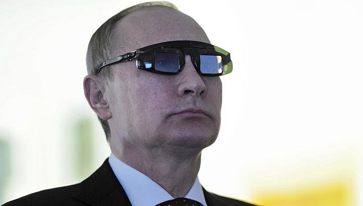 Russian President Vladimir Putin wears special glasses on a laboratory visit in St Petersburg, Russia on Jan 26 2015.&nbsp;One of Vladimir Putin's main opponents may have broken a taboo by publishing what he says is the pseudonym used by one the Russ