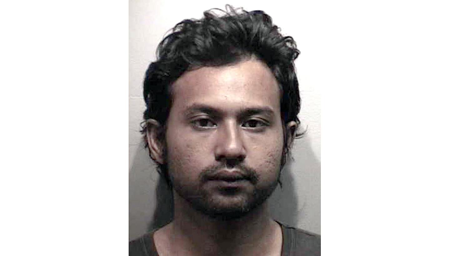 A woman holds a sign in support of Saudia Arabian blogger Raif Badawi during a march on Parliament Hill in Ottawa, Canada on Jan 29, 2015, calling for Badawi's release. --PHOTO: EPA