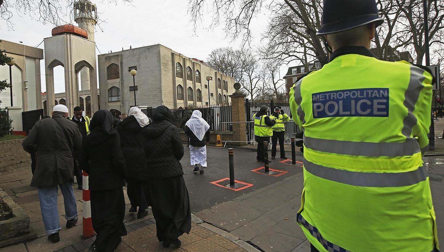 Police carry out a regular patrol as worshippers arrive at the London Central Mosque at Regent's Park in London on Jan 9, 2015.&nbsp;Some 20 mosques in Britain were opening their doors to the public on Sunday, Feb 1, in an unprecedented gesture of re