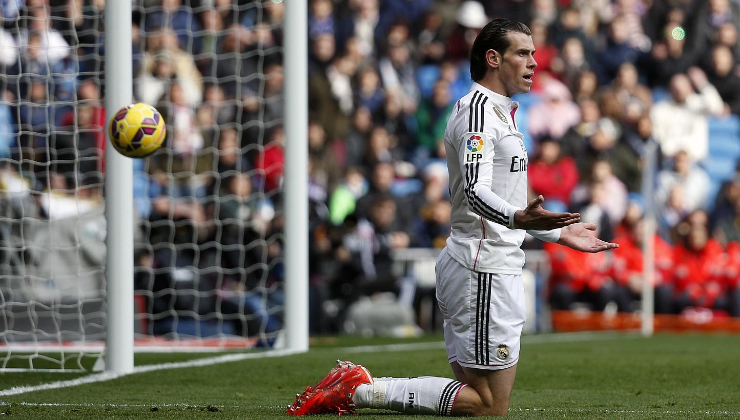Real Madrid's Gareth Bale reacts after a missed scoring opportunity against Real Sociedad during their Spanish first division football match at Santiago Bernabeu stadium in Madrid, on Jan 31, 2015. -- PHOTO: REUTERS