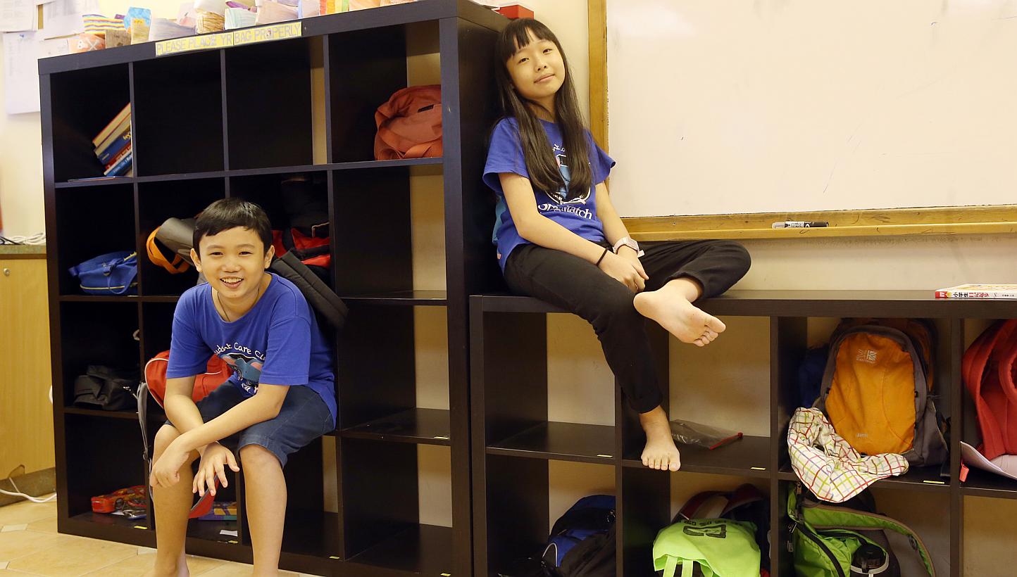 Both Casper Chong (left) and Chin Li Wen receive free tuition at the Stag Match Tuition Centre. Four of Stag Match's 14 branches cater to students from low-income families.