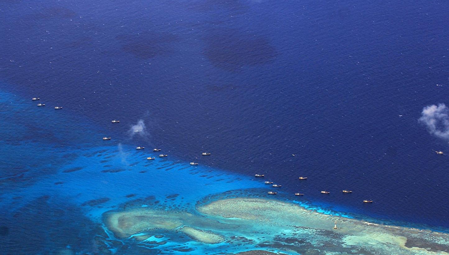 A photo taken on July 17, 2012 and released by the Philippine military's Western Command (WESTCOM) shows Chinese fishing vessels anchored at Fiery Cross Reef (Kagitingan) on the disputed Spratly islands.&nbsp;The Philippines and Vietnam, two of the m