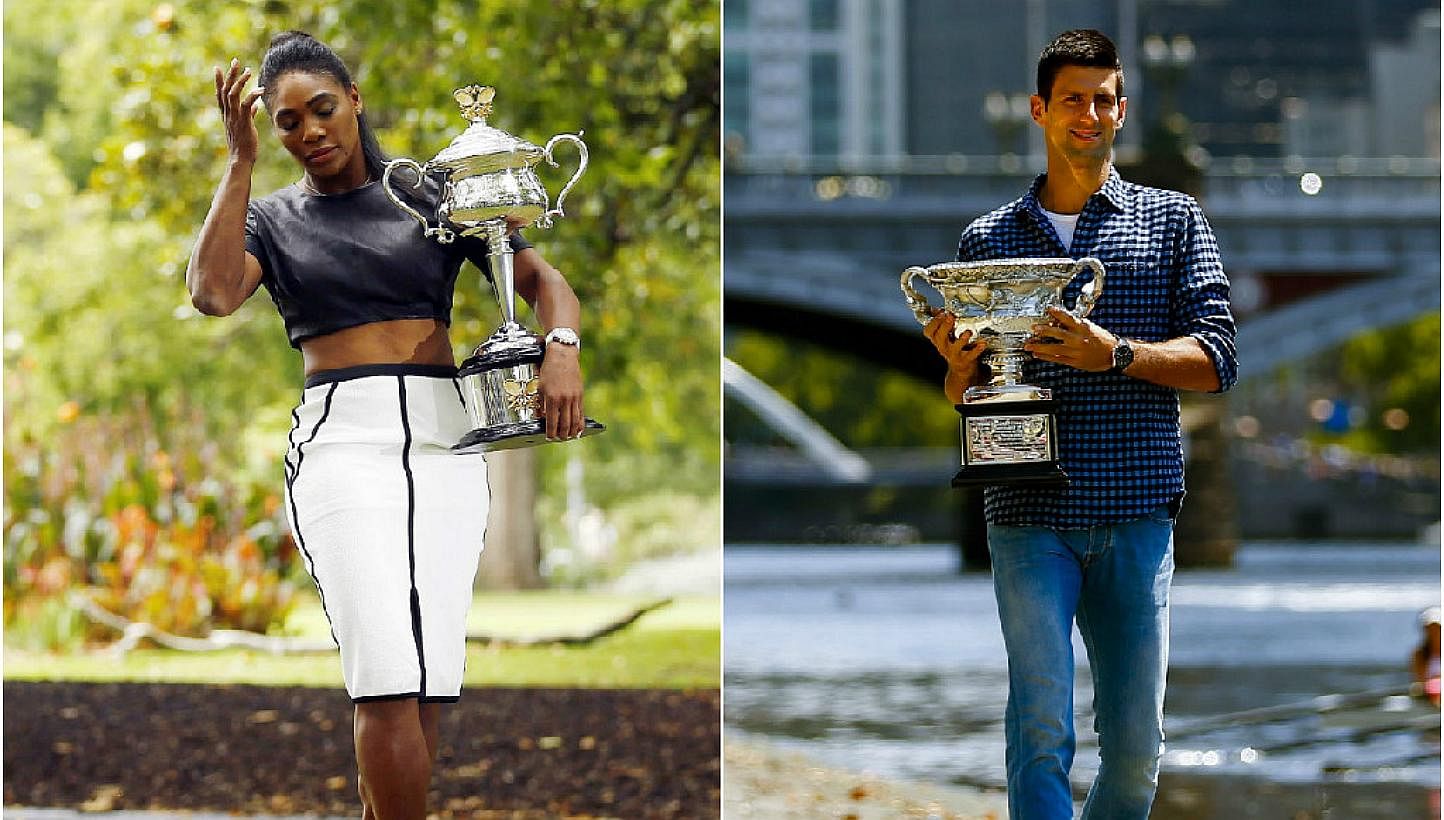 Serena Williams of the US and Serbia's Novak Djokovic pose with their 2015 Australian Open trophies. -- PHOTOS: REUTERS &nbsp;