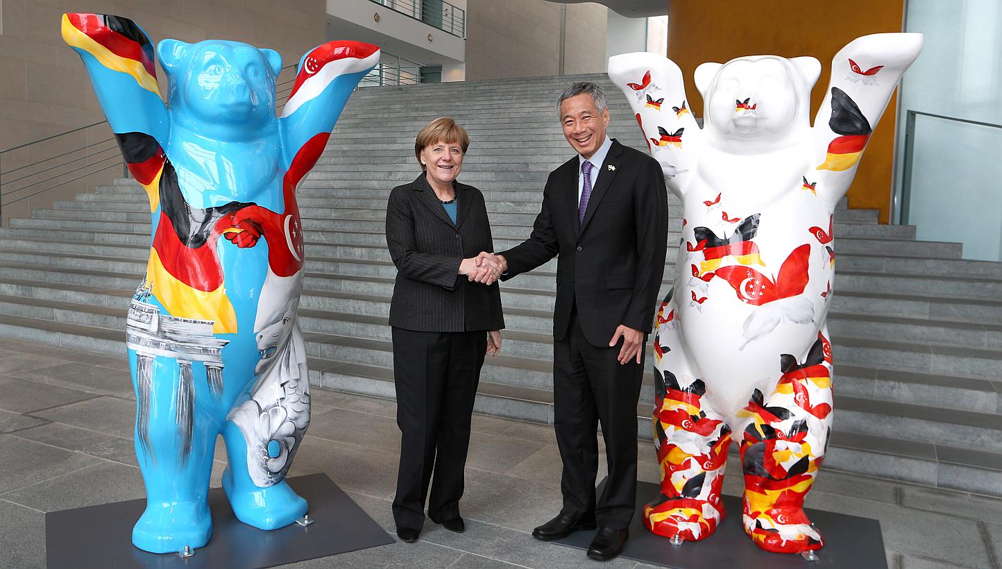 German Federal Chancellor Angela Merkel and Prime Minister Lee Hsien Loong shake hands at the Federal Chancellery in Berlin on Feb 3, 2015. When Prime Minister Lee Hsien Loong met German Chancellor Angela Merkel in Berlin on Tuesday, they posed