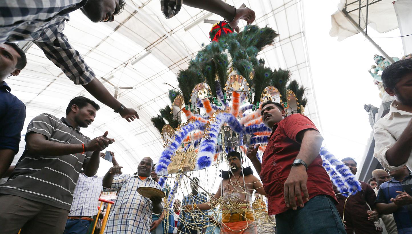 A devotee with his kavadi at Sri Srinivasa Perumal Temple during Thaipusam. The ban on musical instruments during the Thaipusam procession was introduced because of past incidents of fights between competing groups which disrupted the procession, sai