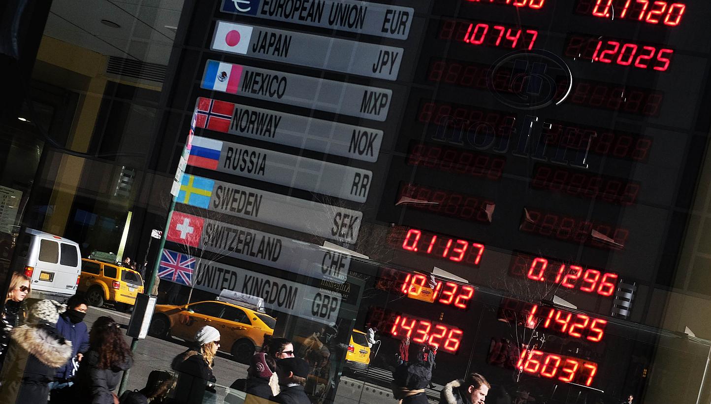 The euro was little changed at US$1.1469 after surging 1.2 per cent overnight in a short covering rally. -- PHOTO: AFP