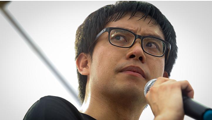 Blogger Roy Ngerng at the Return Our CPF protest at Hong Lim Park on June 7, 2014. After a day of to-ing and fro-ing, the $29,000 owed in costs to Prime Minister Lee Hsien Loong, whom Mr Ngerng had defamed, was finally paid on Friday evening. -- ST P