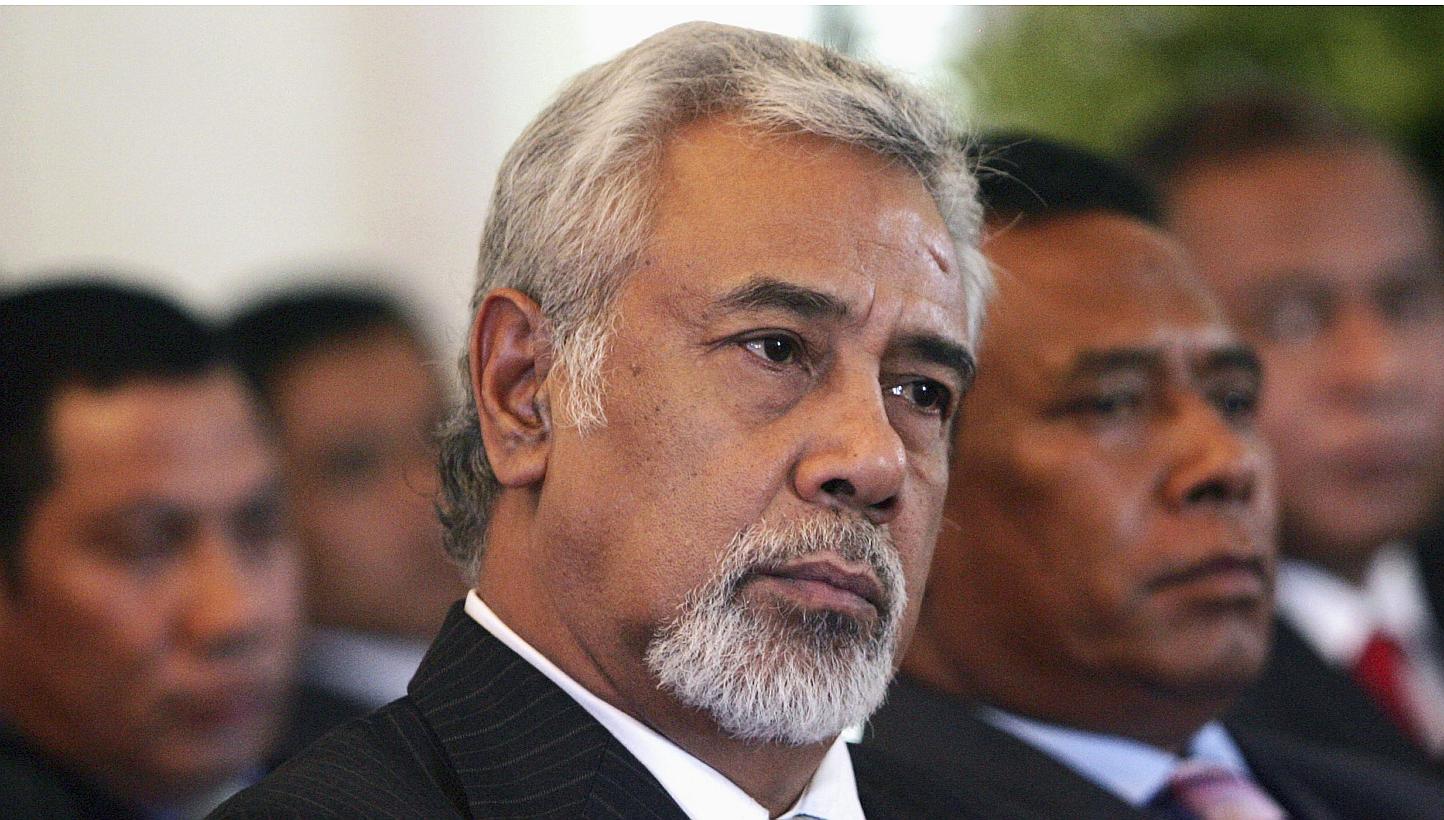 East Timor's Prime Minister Xanana Gusmao (centre) sits with cabinet members as he waits to be sworn in as the new Prime Minister in Dili in this 2012 file photo. -- PHOTO: REUTERS