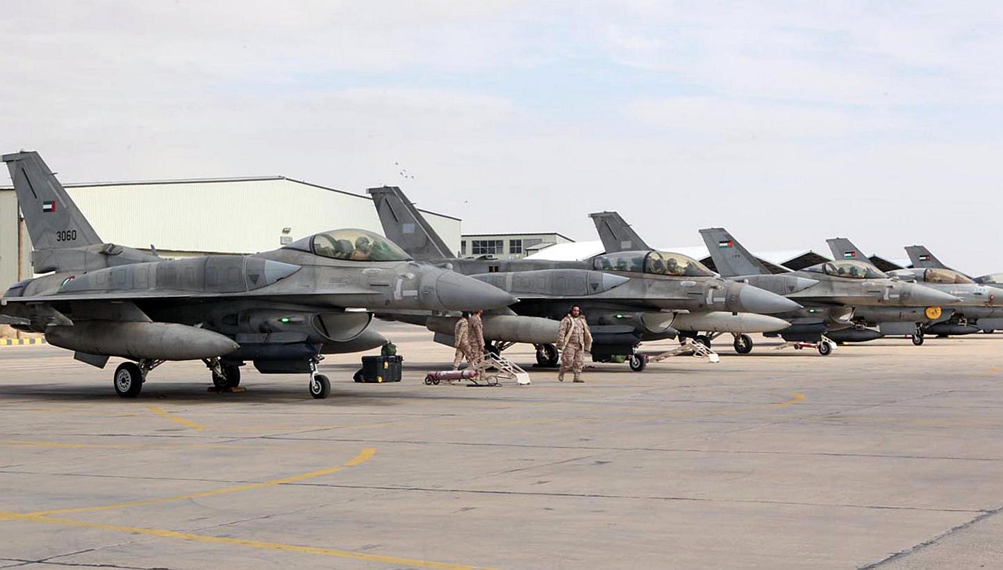 A squadron of United Arab Emirates F-16 fighters stationed in one of Jordan's air bases to support strikes against the Islamic State group on Feb 8, 2015. -- PHOTO: AFP