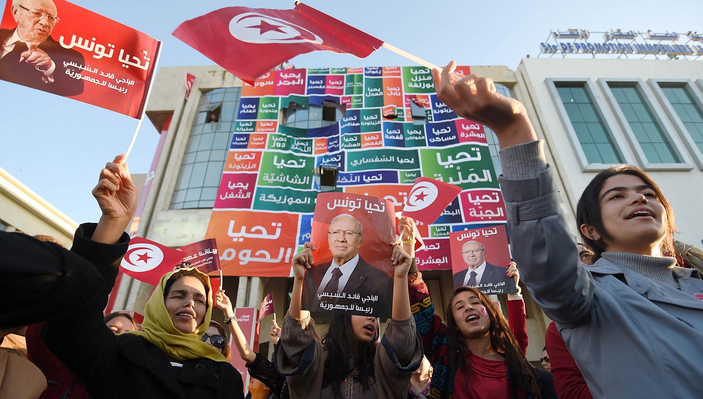 Supporters of Tunisia's newly-elected President Beji Caid Essebsi on Dec 22. The country was where the Arab Spring movement began. However, naive Western responses to the movement, along with the ill-considered 2003 American intervention in Iraq, bro