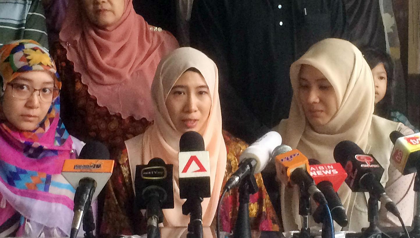 Nurul Nuha Anwar (centre), Anwar Ibrahim's daughter, speaking at a press conference at Anwar's house in Kuala Lumpur on Feb 11, 2015. She was unveiled yesterday as the face of the "March to Freedom" campaign, aimed at ratcheting up pressure at home a