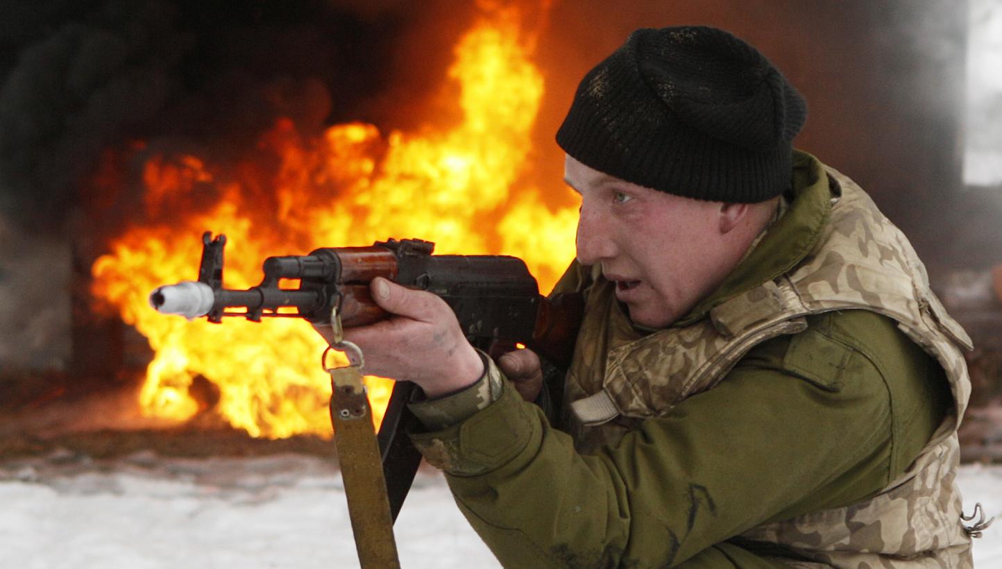 A newly mobilised soldier trains with a weapon at a Ukrainian ground forces training centre in the Chernihiv region Feb 13, 2015. The United States charged Friday that Russia was continuing to deploy heavy weapons in eastern Ukraine, before a ceasefi