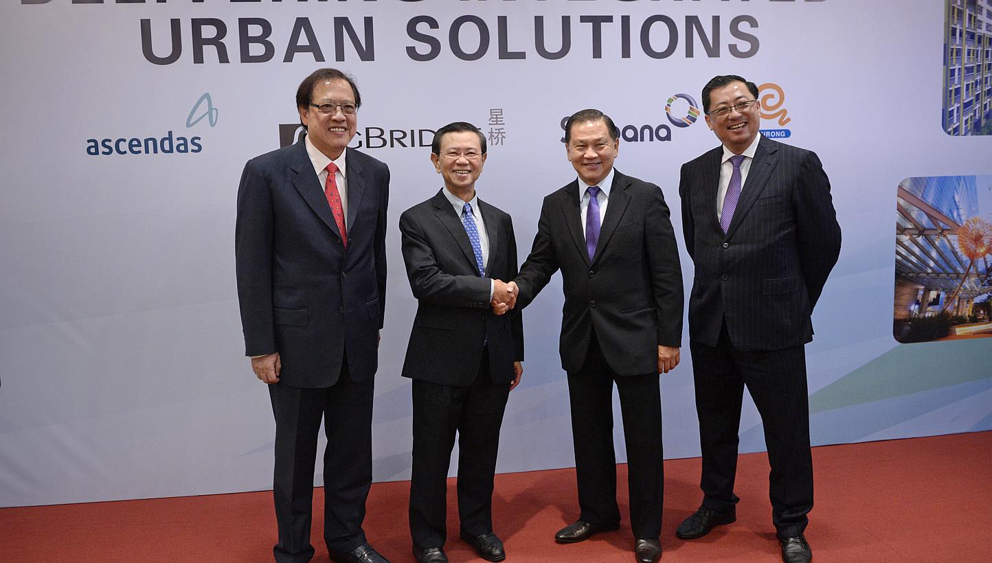 (From left) CEO of Ascendas-Singbridge Miguel Ko, chairman of Ascendas-Singbridge Wong Kan Seng, chairman of Surbana-JIH Liew Mun Leong and CEO of Surbana-JIH Wong Heang Fine, pictured after the press conference held by Temasek and JTC to announce th