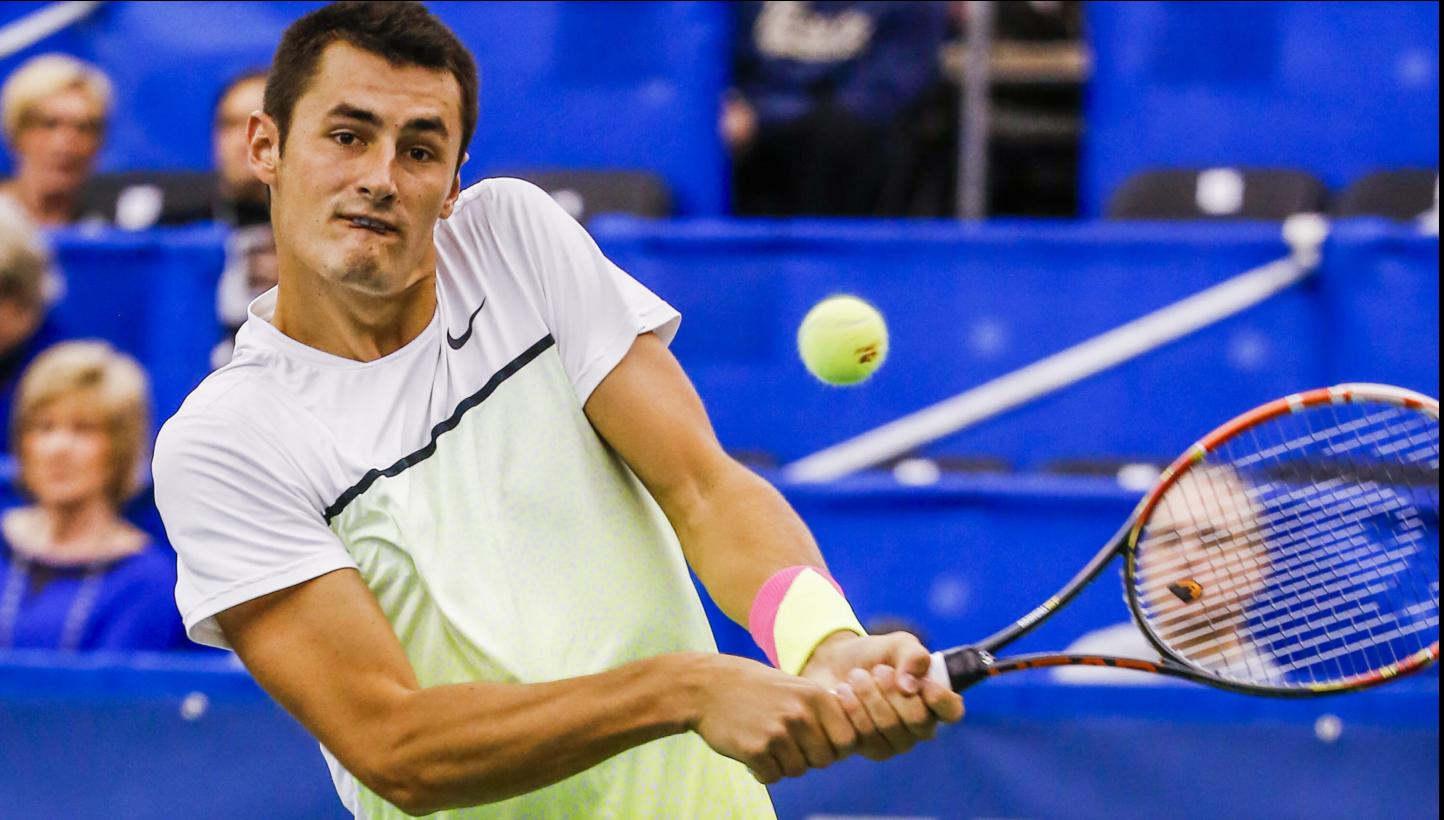 Bernard Tomic of Australia hits a return shot to Alexandr Dolgopolov (above) of Ukraine in their quarter-round Memphis Open tennis match at the Racquet Club of Memphis in Memphis, Tennessee, US, on Feb 12, 2015. -- PHOTO: EPA