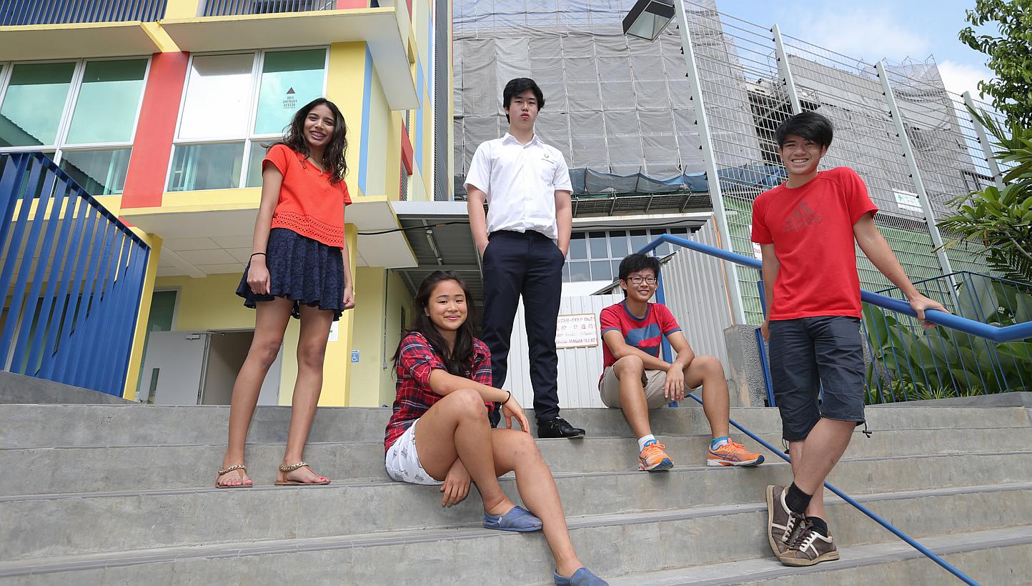 Singaporean ACS (International) students (from left) Salima Sheryl, Emily Ong, Joshua Tan Wee Kiat, Ammon Ng Tzu-Herng and Samuel Lee Zheng Yu. The school expanded its facilities at its Holland Village campus last year and has already seen its enrolm