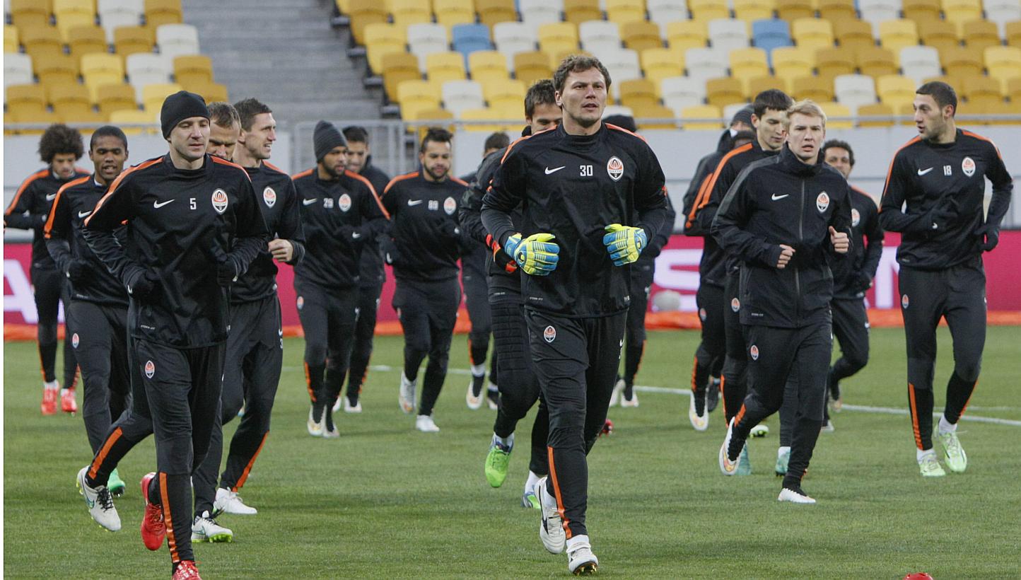 Shakhtar Donetsk's players take part in a training session at the Lviv Arena stadium in Lviv on Feb 16, 2015. The team is hoping a surprise Champions League victory over 2013 winners Bayern Munich on Tuesday can bring some brief cheer to their t