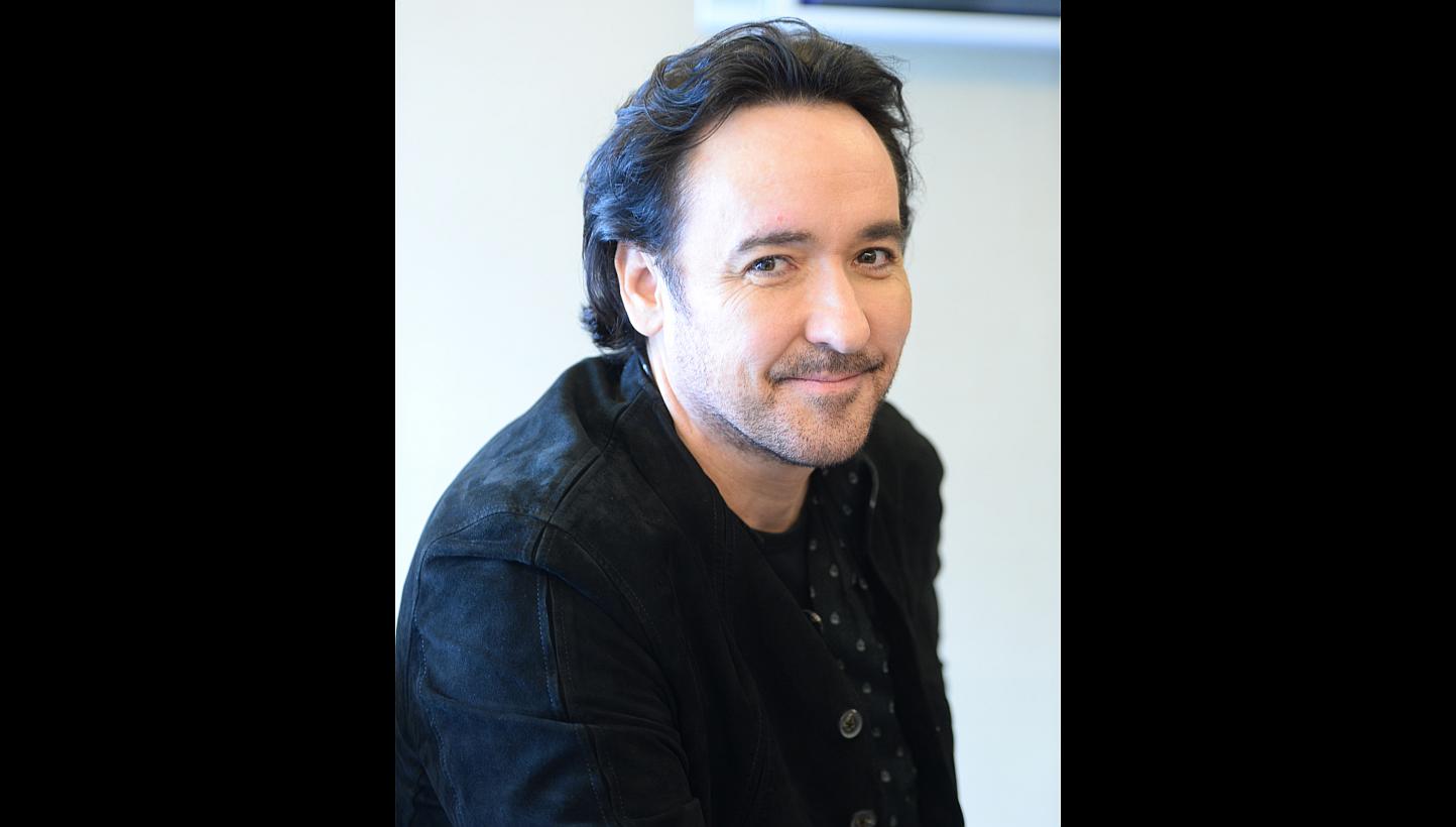 Kickboxing practitioner John Cusack (above) enjoyed his experience filming in the Silk Road region for Dragon Blade.