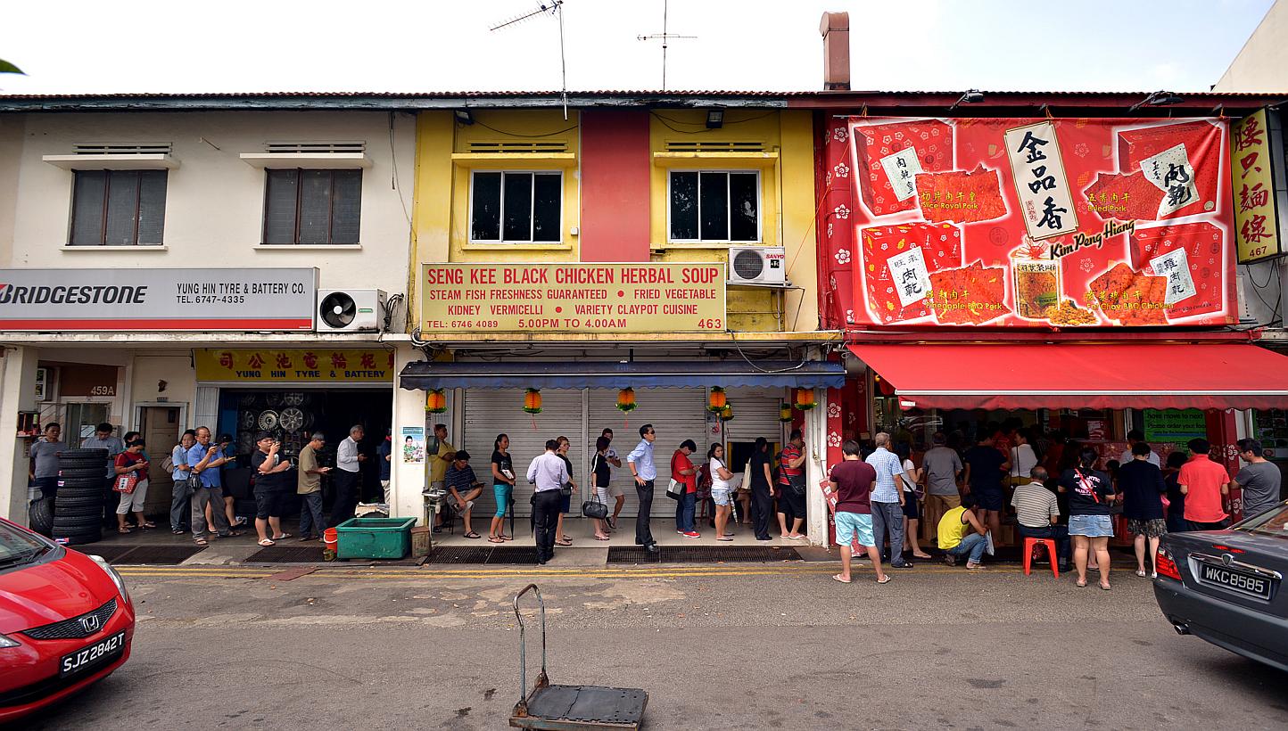 A 15 metre long queue forms outside Kim Peng Hiang bak kwa stall on Feb 11, 2015. Every year, Singapore's inflation has usually ticked up in the weeks before Chinese New Year, partly because of the higher prices of the beloved bak kwa, or barbecued p