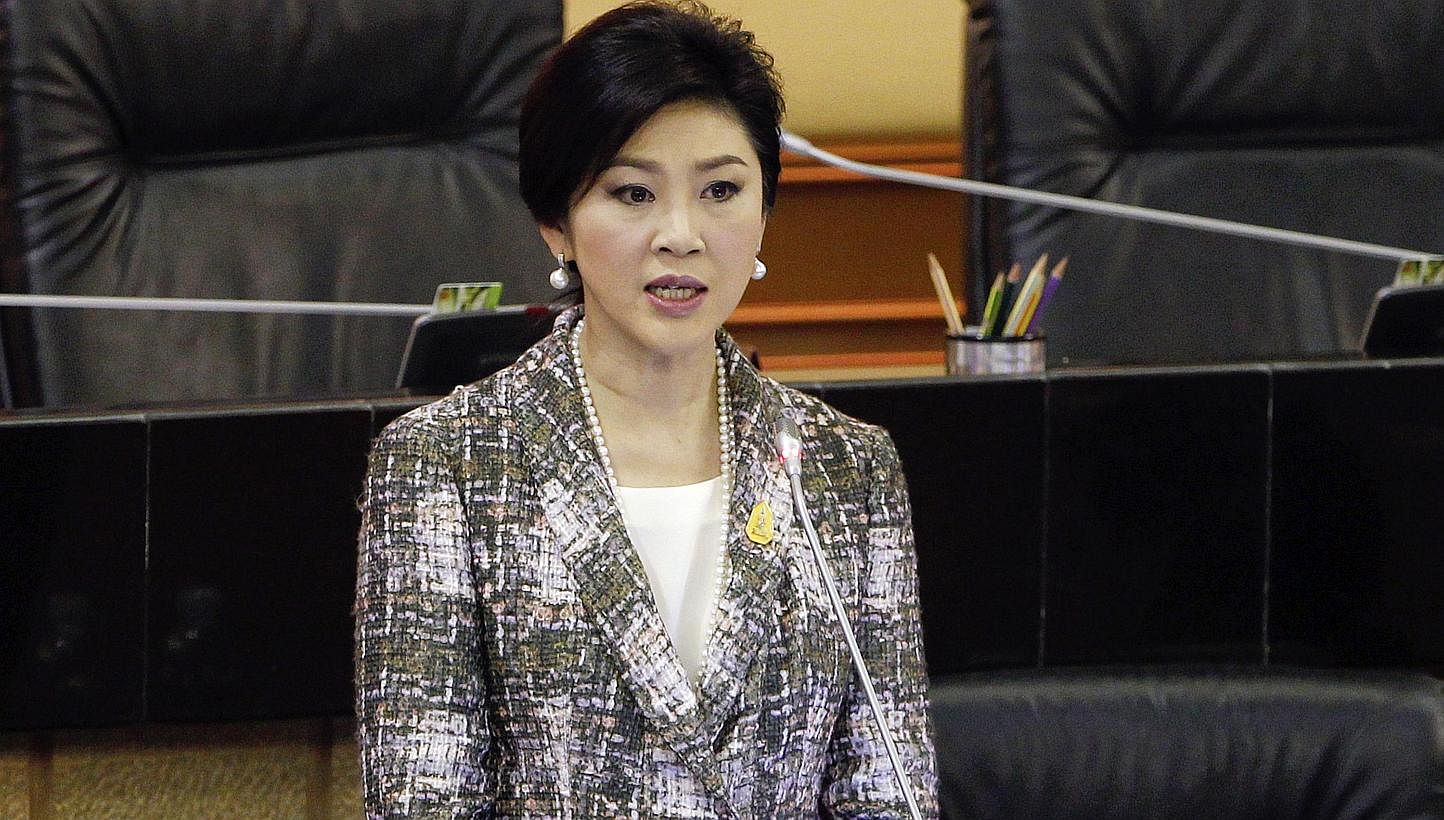 Thai politics is heating up again following the impeachment of former prime minister Yingluck Shinawatra (seen above) for dereliction of duty. --PHOTO: REUTERS