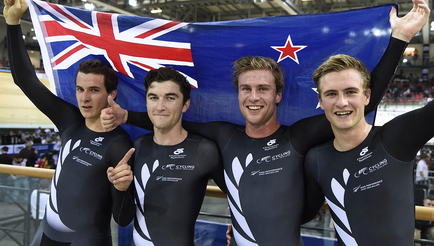Members of the New Zealand team (from left) Marc Ryan, Dylan Kennett, Pieter Bulling, and Alex Frame pose after winning the Men's Team Pursuit Final at the UCI Track Cycling World Championships on Feb 19, 2015. -- PHOTO: AFP&nbsp;
