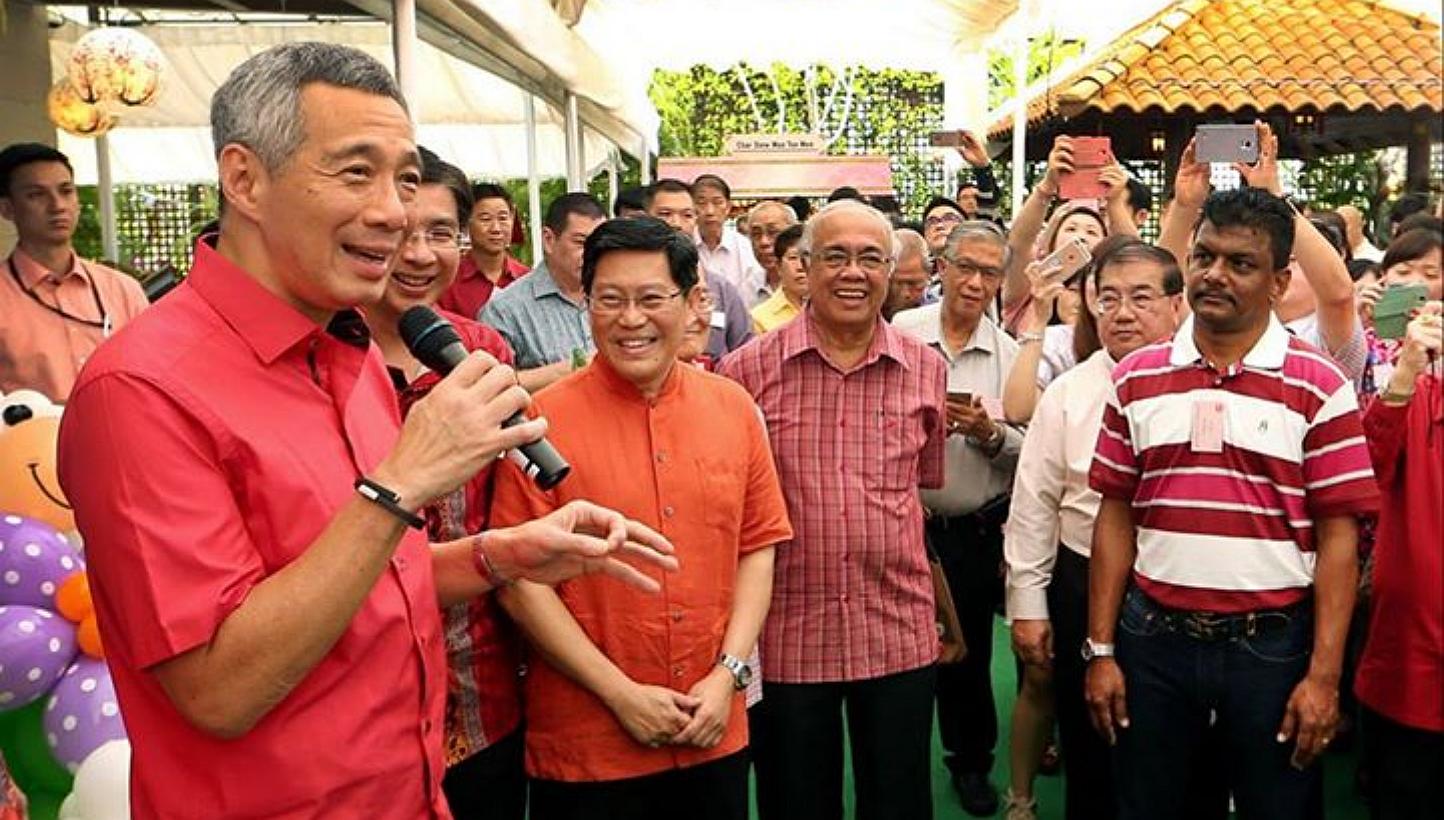 There was also plenty of festive cheer as Prime Minister Lee Hsien Loong (left) and his wife hosted a Chinese New Year open house at their home, just days after he underwent surgery to remove his prostate gland. -- PHOTO: FACEBOOK/ LEE HSIEN LOO