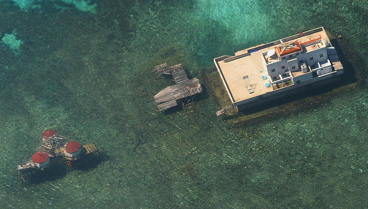 Chinese-built structures in the disputed Spratly Islands. Some observers have suggested that China's "nine dashed lines" map, which seems to enclose the busy sea lanes of the South China Sea, harks back to the mare clausum (closed sea) principles fav