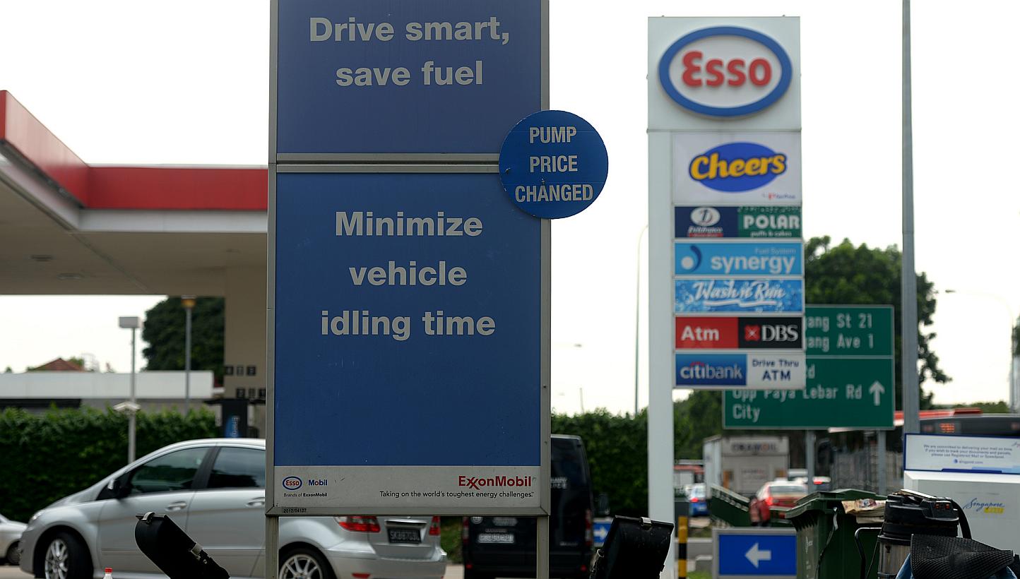 An Esso station along Upper Serangoon Road in December 2014. Pump prices across all four petrol companies were up on Tuesday, following Monday's Budget announcement of a hike in petrol duties. -- PHOTO: ST FILE 