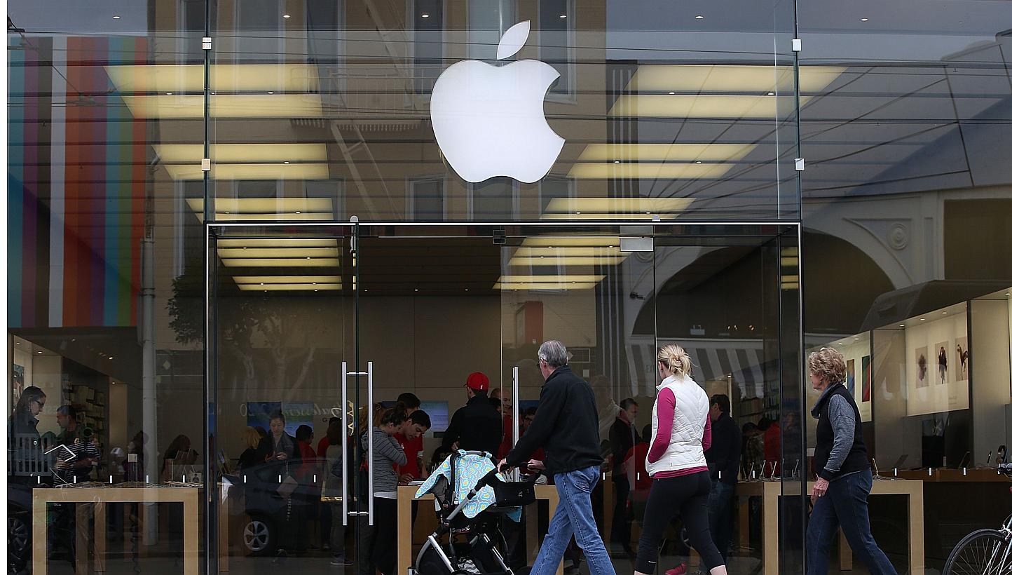 Apple Pay is available in the recently updated iPhone 6 software and accepted in 220,000 stores. It allows iPhone users to pay for purchases using their iPhone's NFC capabilities instead of using their credit card. -- PHOTO: AFP&nbsp;