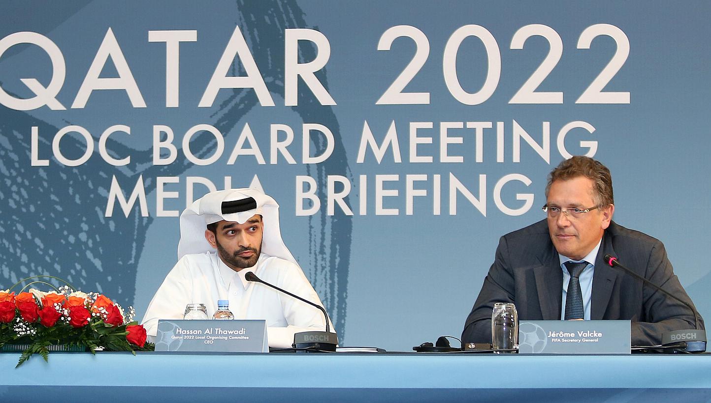 Fifa Secretary General Jerome Valcke (right) and head of the Qatar 2022 World Cup organising committee Hassan al-Thawadi give a press conference to defend the football's ruling body's controversial proposal to shift the 2022 World Cup from the normal