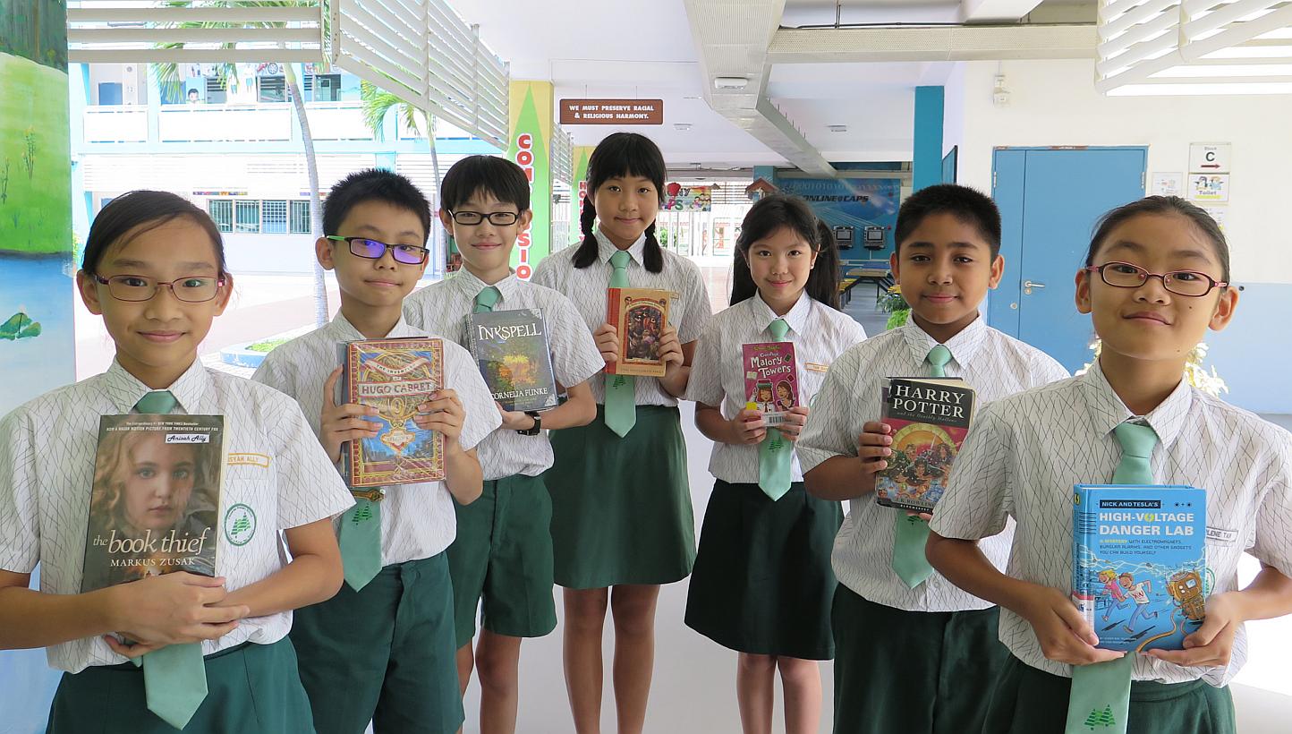 Casuarina Primary pupils who will be taking part in the preliminary round of the National Spelling Championship on Mar 7. (From left) They are Aisyah Shaik Ahmed Ally, Poh Zhi Nan, Soh Jue Ning, Charmaine Lee, Tan Qian Xun, Muhammad Daanish Zuklife a
