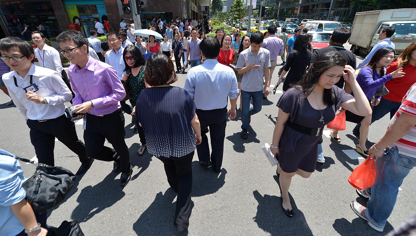 The Government will be giving out individual study awards of up to $5,000 to support young and mid-career workers who are looking to upgrade their skills. -- PHOTO: ST FILE