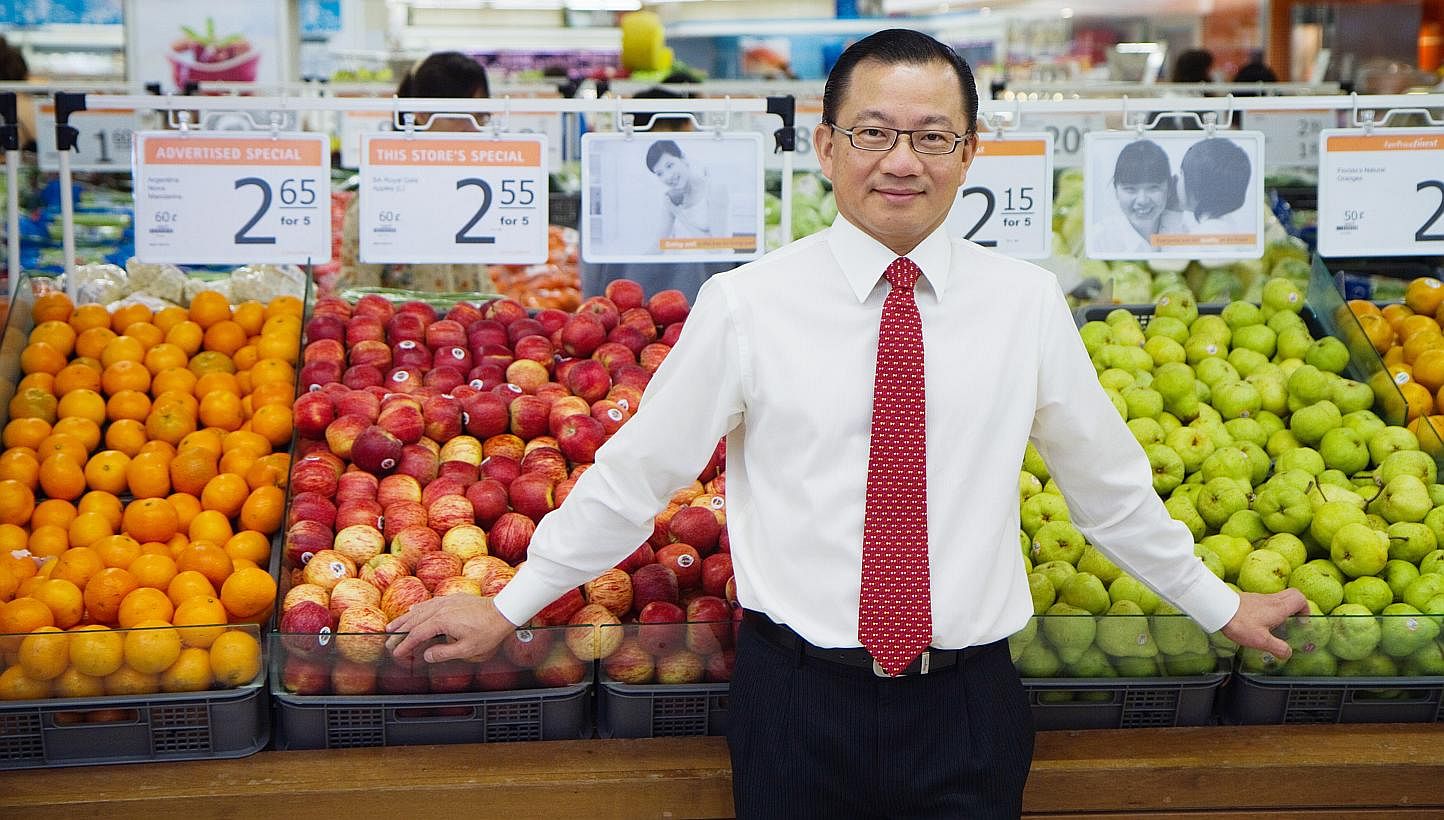Mr Seah Kian Peng, chief executive of NTUC FairPrice. The local supermarket chain has more than doubled its goal for annual staff volunteer hours to 5,000 this year. --PHOTO: NTUC FAIRPRICE