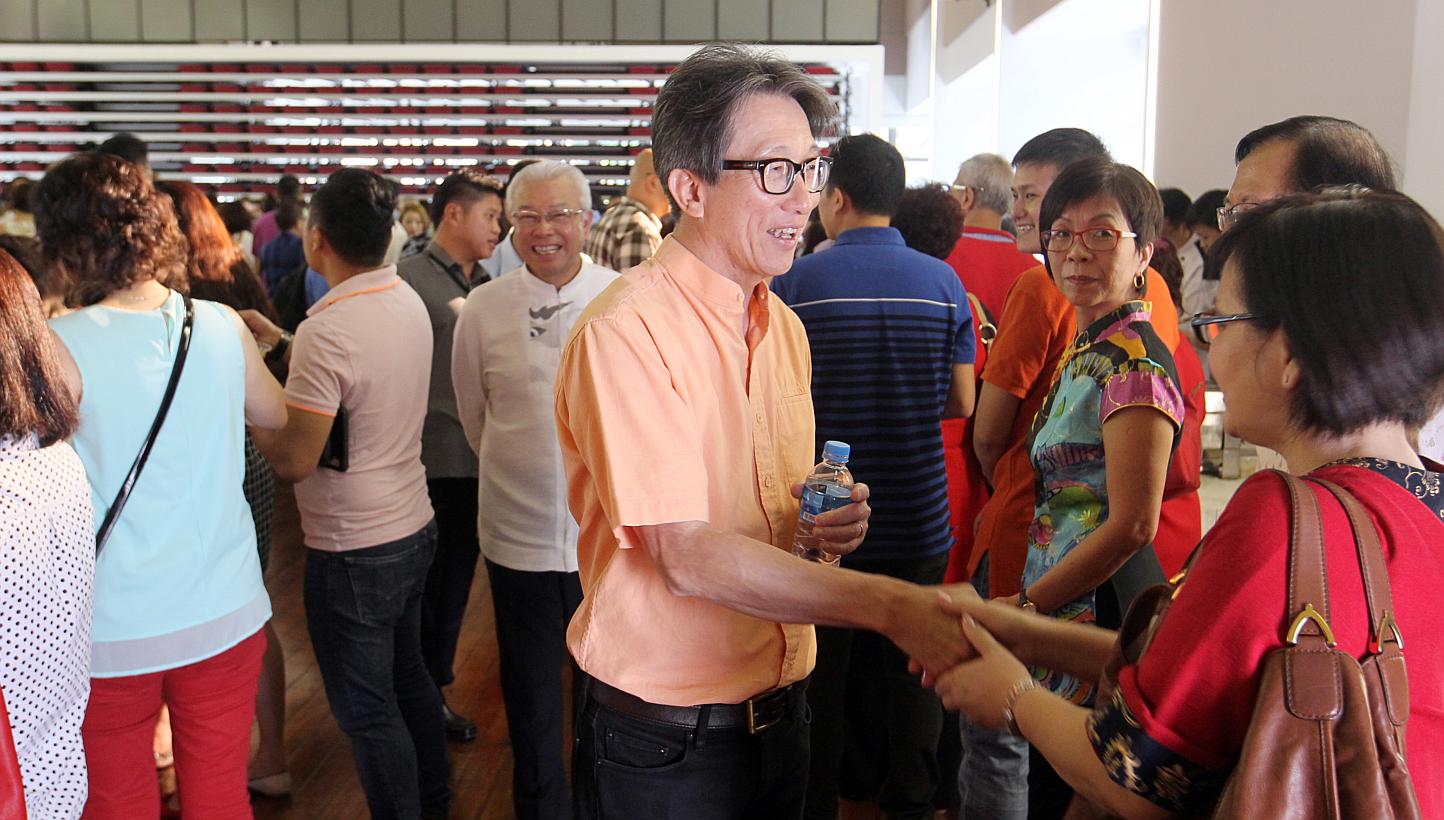 Guest of honour Lim Swee Say attends Hokkien Huay Kuan's first CNY get-together at their new premise in Sennett Road. -- PHOTO: ZAOBAO