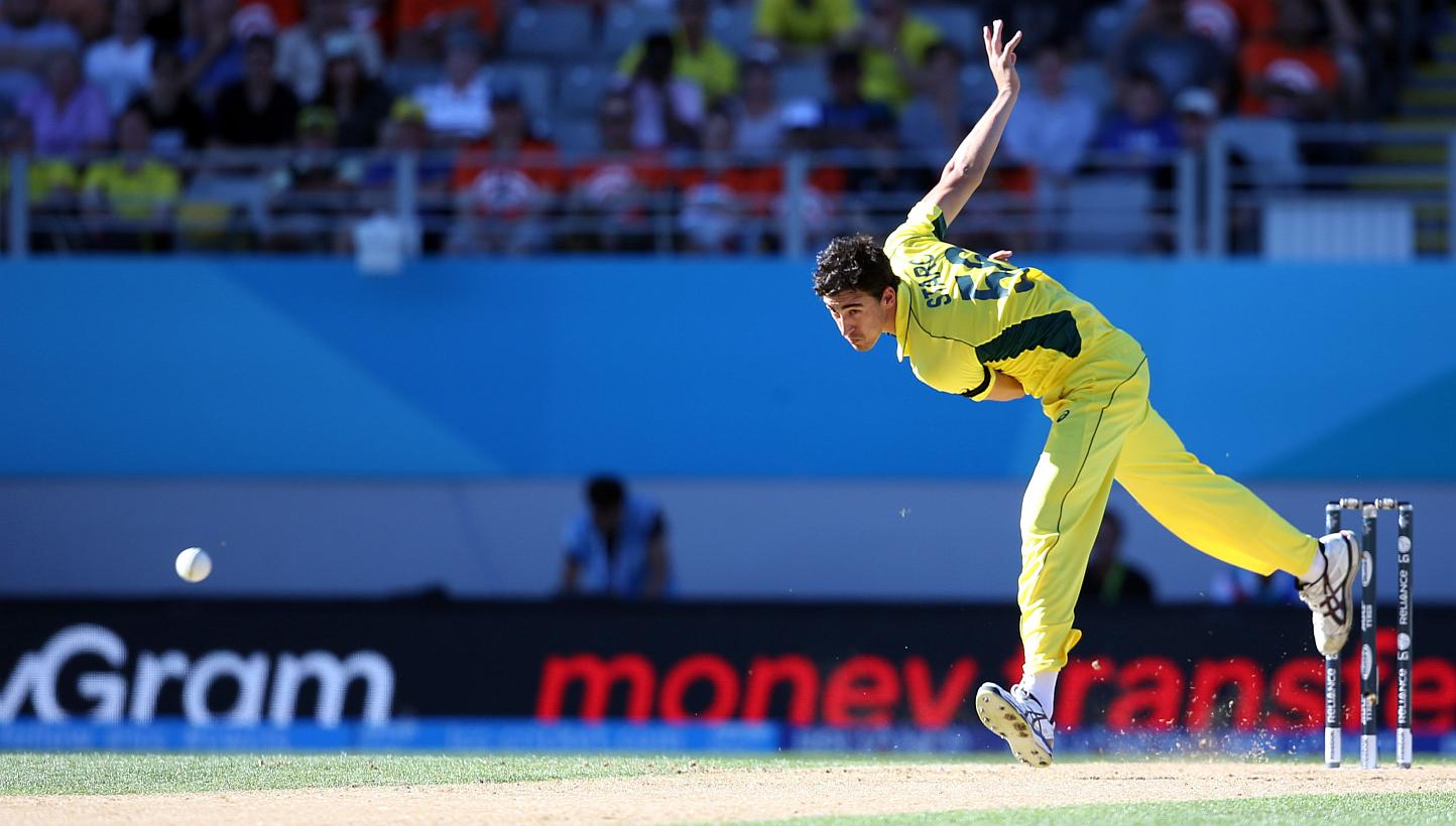 Australia's Pat Cummins bowls during the Pool A 2015 Cricket World Cup match between New Zealand and Australia at Eden Park in Auckland on Feb 28, 2015. -- PHOTO: AFP