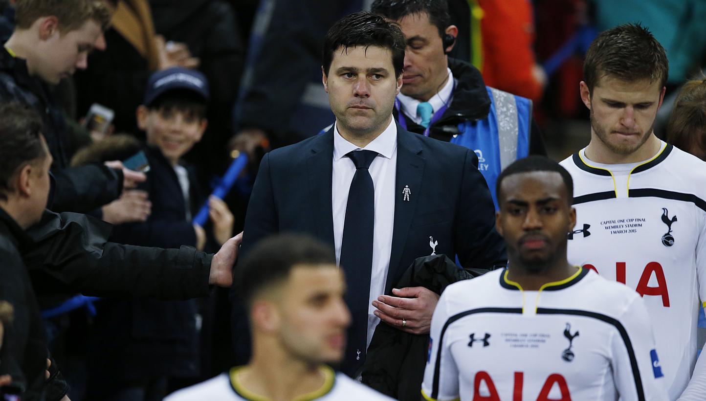 Tottenham manager Mauricio Pochettino and his players looking dejected after their League Cup final defeat to Chelsea at Wembly on March 1, 2015. -- PHOTO: REUTERS 