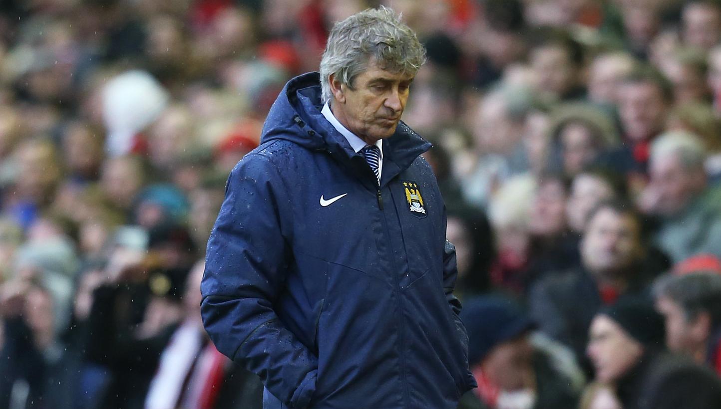 Manchester City manager Manuel Pellegrini looking dejected during his team's English Premier League match against Liverpool on Sunday, March 1, 2015. Manchester City lost 2-1. -- PHOTO: REUTERS