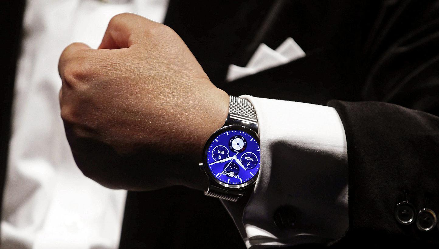 Mr Richard Yu, CEO of Huawei Technologies Consumer Business Group, presents the Huawei Watch during the Mobile World Congress mobile communications convention in Barcelona, Spain, on Mar 1, 2015.&nbsp;China's Huawei Technologies unveiled its first sm