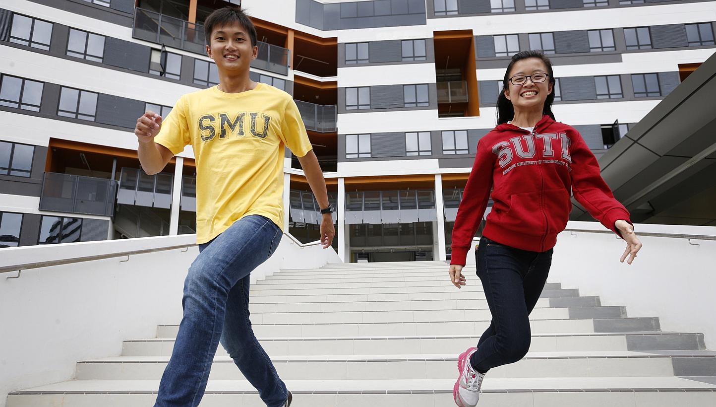 Among the pioneer batch are students Clement Chua (left), 22, and Yeo Pei Shan, 20. At the end of the course, they will graduate with a bachelor of business management from SMU and a bachelor of engineering from SUTD.