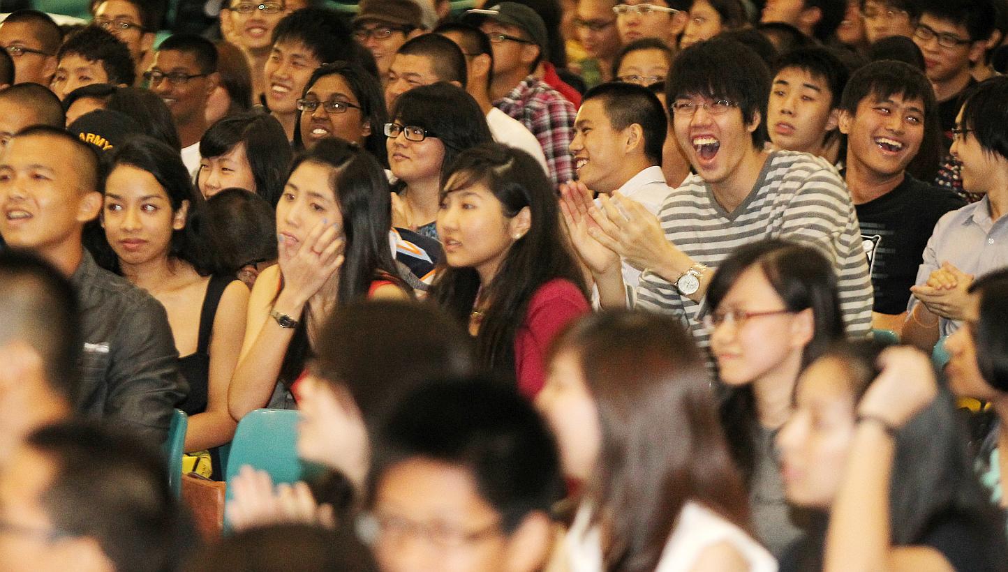 Junior College students cheering during the release of GCE A-level results. About 14,000 students took the A-level examinations last year and will be collecting their results on March 2, 2015. -- PHOTO: ST FILE 
