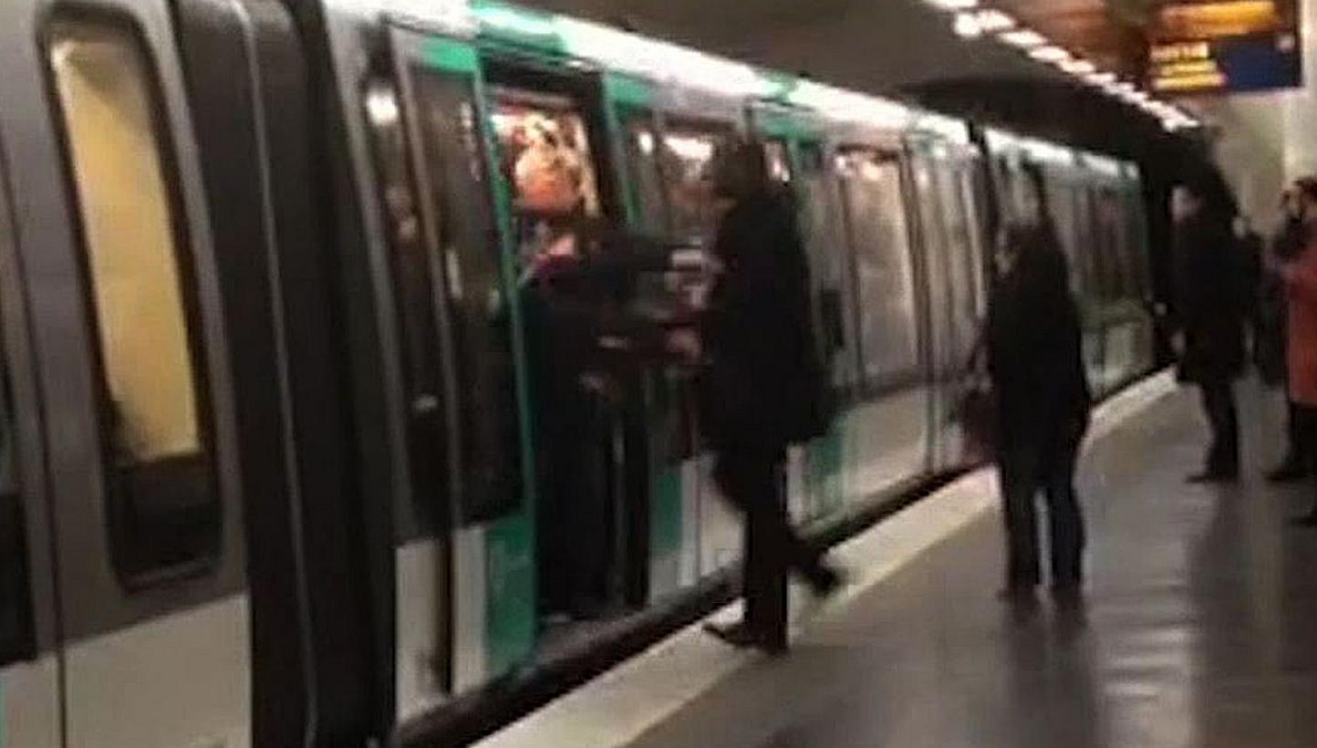 A video grab taken from footage obtained from Guardian News &amp; Media Ltd in the United Kingdom on Feb 18, 2015 shows Chelsea football fans packed onto a Paris Metro train pushing a passenger to prevent him from boarding the carriage at a station i