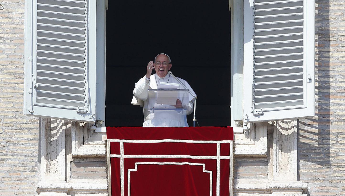  Pope Francis leads his Sunday Angelus prayer in Saint Peter's square at the Vatican on Sunday. -- PHOTO: REUTERS