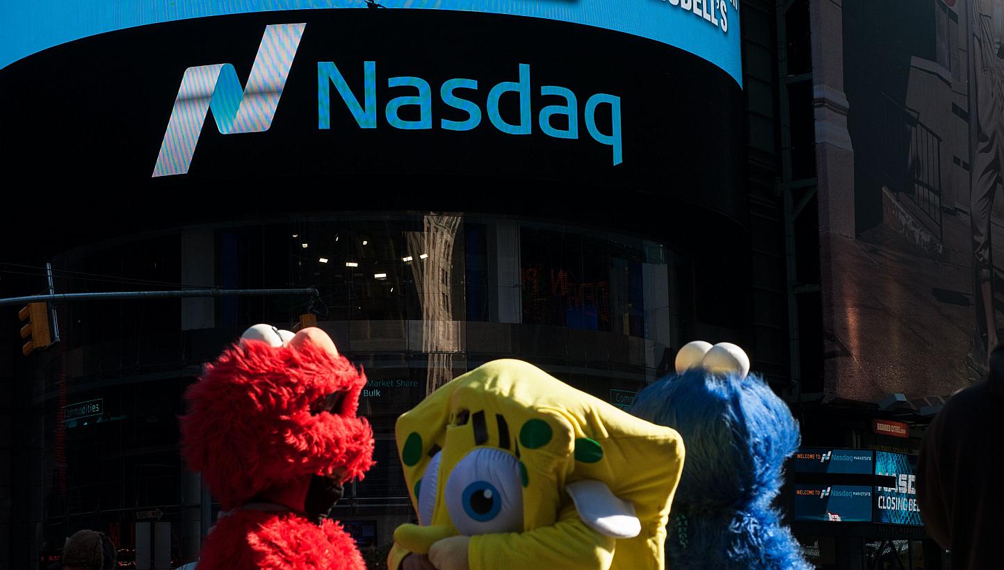 The Nasdaq Composite added 0.9 per cent to 5,008.10 at 4 pm in New York, reaching a 15-year high. -- PHOTO: AFP&nbsp;