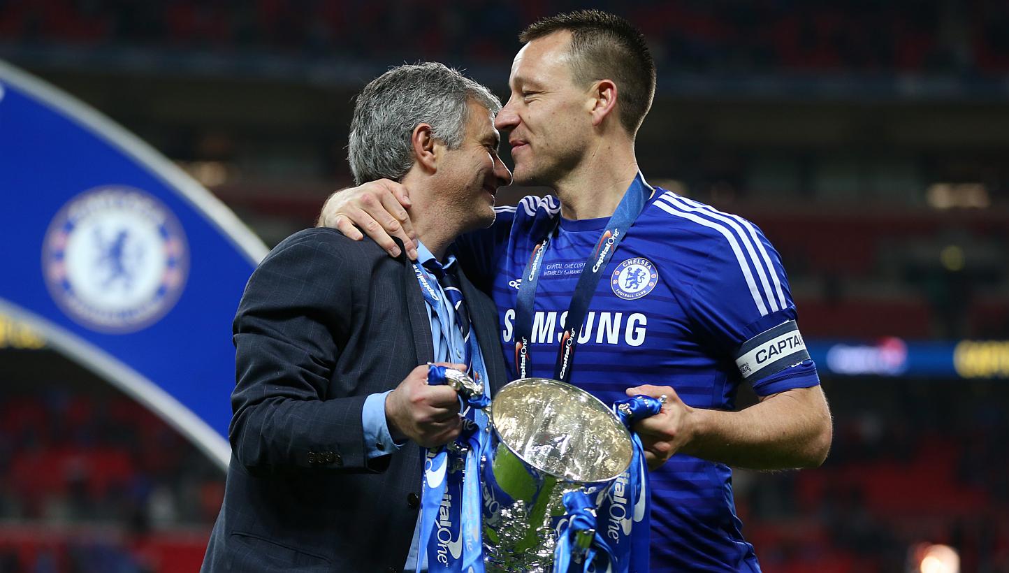 Jose Mourinho (left) has assured Chelsea fans that John Terry, subject of a "captain, leader, legend" banner that is on permanent display at Stamford Bridge, will be at the English Premier League club next season. -- PHOTO: REUTERS