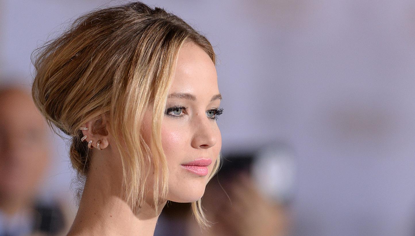 Actress Jennifer Lawrence at the Los Angeles premiere of The Hunger Games: Mockingjay - Part 1 at the Nokia Theatre LA Live in Los Angeles, California on Nov 17, 2014. She will star in Steven Spielberg's It's What I Do: A Photographer's Life Of Love 