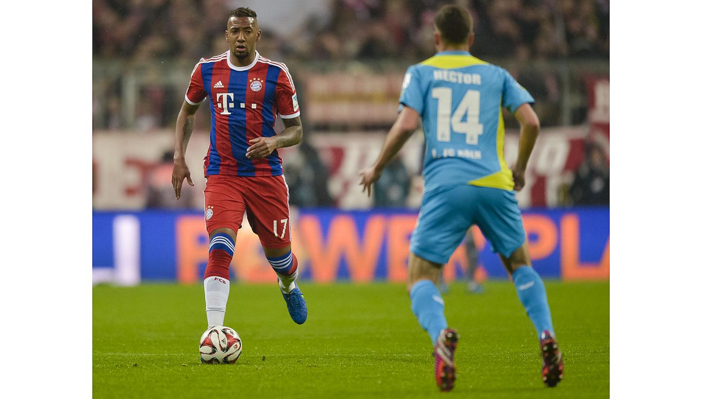 Bayern Munich's defender Jerome Boateng (left) and Cologne's defender Jonas Hector vie for the ball during their German first division Bundesliga football match in Munich on Feb 27, 2015.&nbsp;Boateng revealed he turned down an offer to join Barcelon