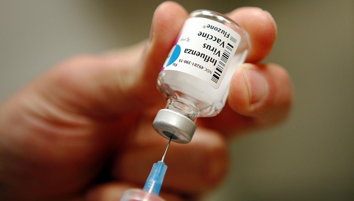 A nurse preparing an injection of the influenza vaccine at Massachusetts General Hospital in Boston, Massachusetts on Jan 10, 2013.&nbsp;Scientists have found that adults only get flu twice a decade on average. -- PHOTO: REUTERS